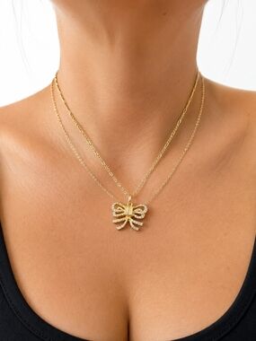 Celine Triomphe and crystal ribbon bow Necklace